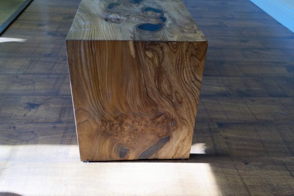 End view of waterfall table made from elm and resin