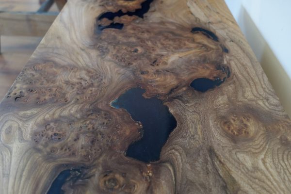Detailed view of burr elm coffee table top