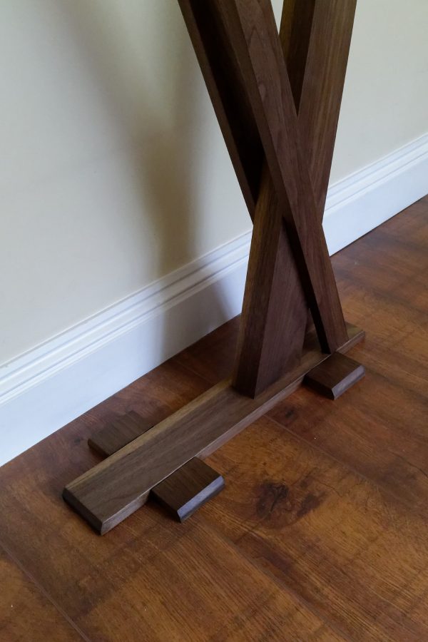 Walnut console table with crossover legs
