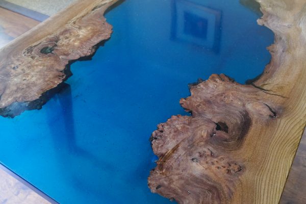 Close up of burr Elm and Marine Blue Epoxy Resin Table top