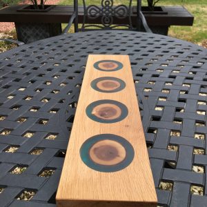 Oak and Resin Charcuterie Serving Board on Outside Table