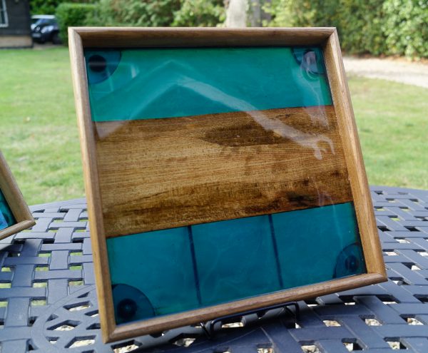 Close up of Square Tray made from Elm and blue Resin shot outdoors