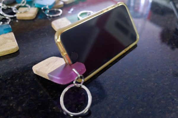 Oak and Resin Phone Stand Key Ring Holding Phone