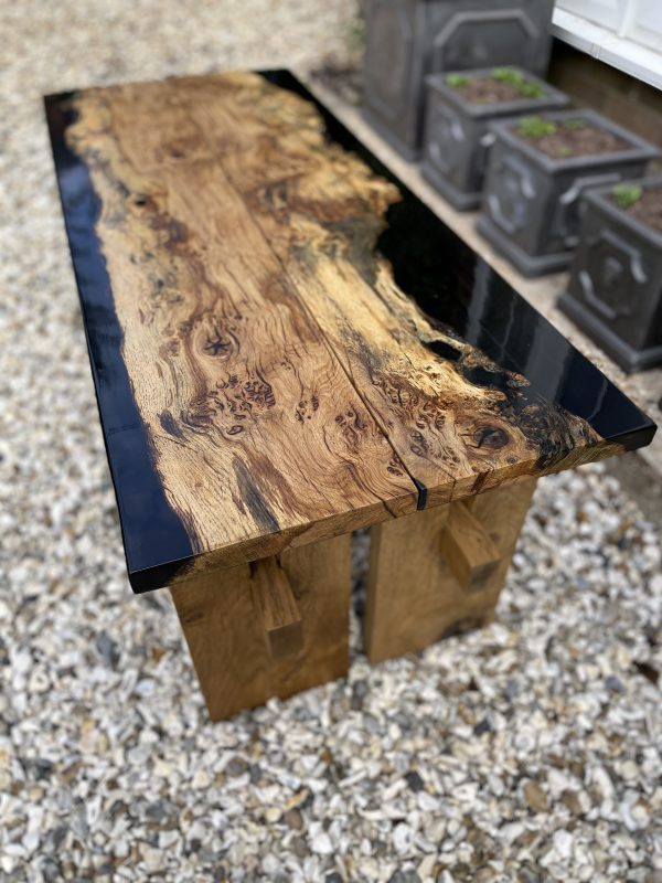 Two oak and resin benches pushed together