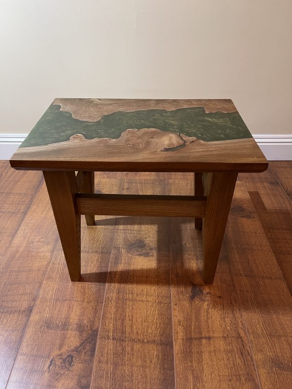 Elm and Green Rose Gold Resin Occasional Table on Wooden floor
