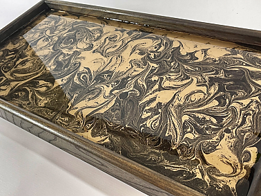 Ebonised elm ottoman tray with black and gold resin