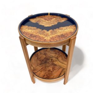 View from front top of round occasional table made from elm and sea blue resin