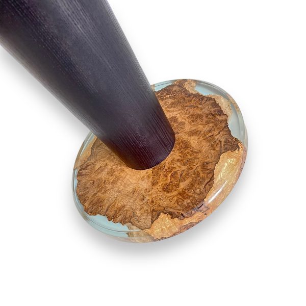 Detail of the table foot of the the oak and resin table
