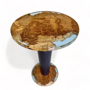 Round occasional table with glass-like resin infusion