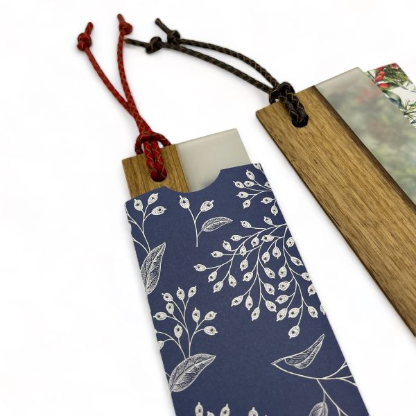 Walnut and resin bookmarks in coloured paper carrying sleeve