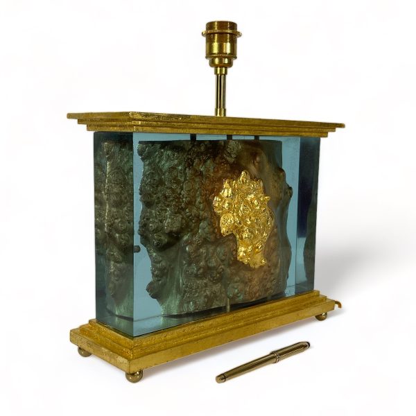 Angled front view of 'carriage clock' lamp showing 24 carat gold leaf gilding - without shade